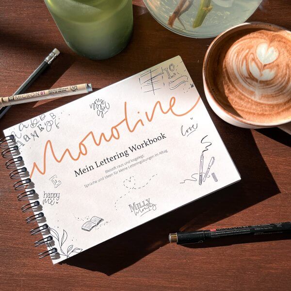 Milly Montags Monoline Lettering Workbook auf dem Kaffeetisch