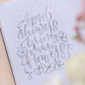 April showers bring may flowers lettering